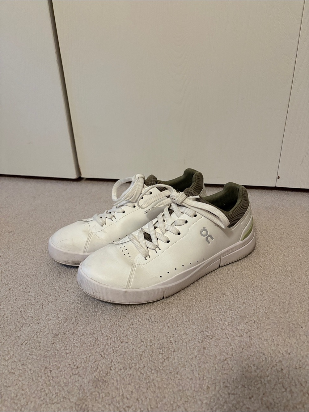 On Men's Roger Advantage White Sneakers with Olive Accents